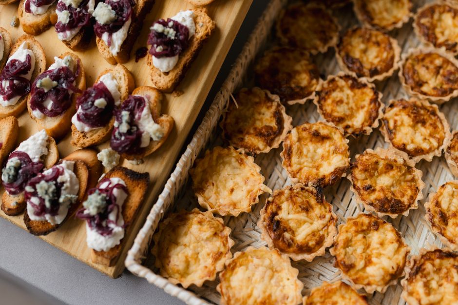 Gourmet appetizers tray being served at a wedding