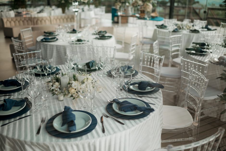 Elegant wedding table setting with fine linens and glassware